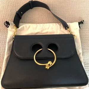 JW ANDERSON PIERCE navy blue leather bag.